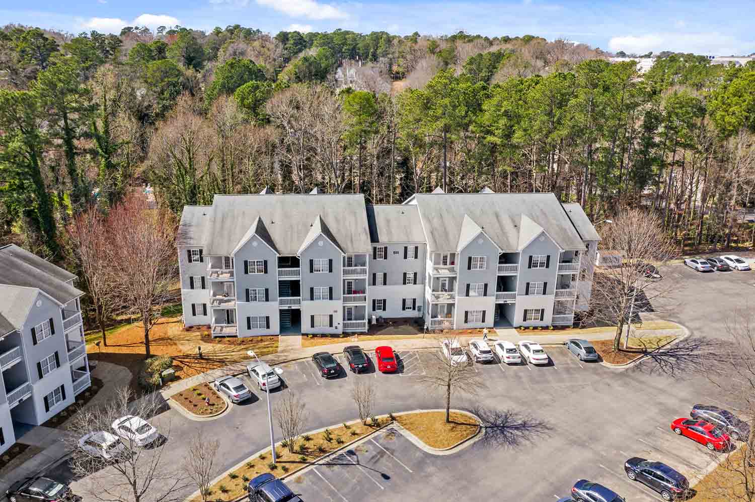 Blue hill top view of the building and parking lot
